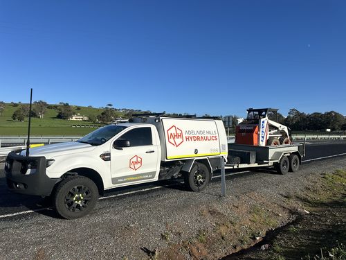 Hydraulic hose repair on heavy machinery